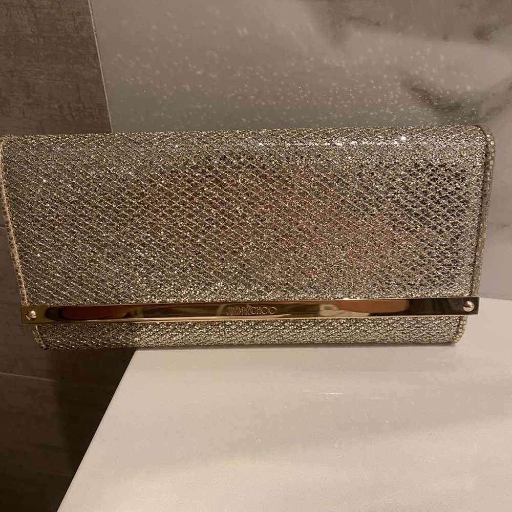 Jimmy Choo clutch with long strap
